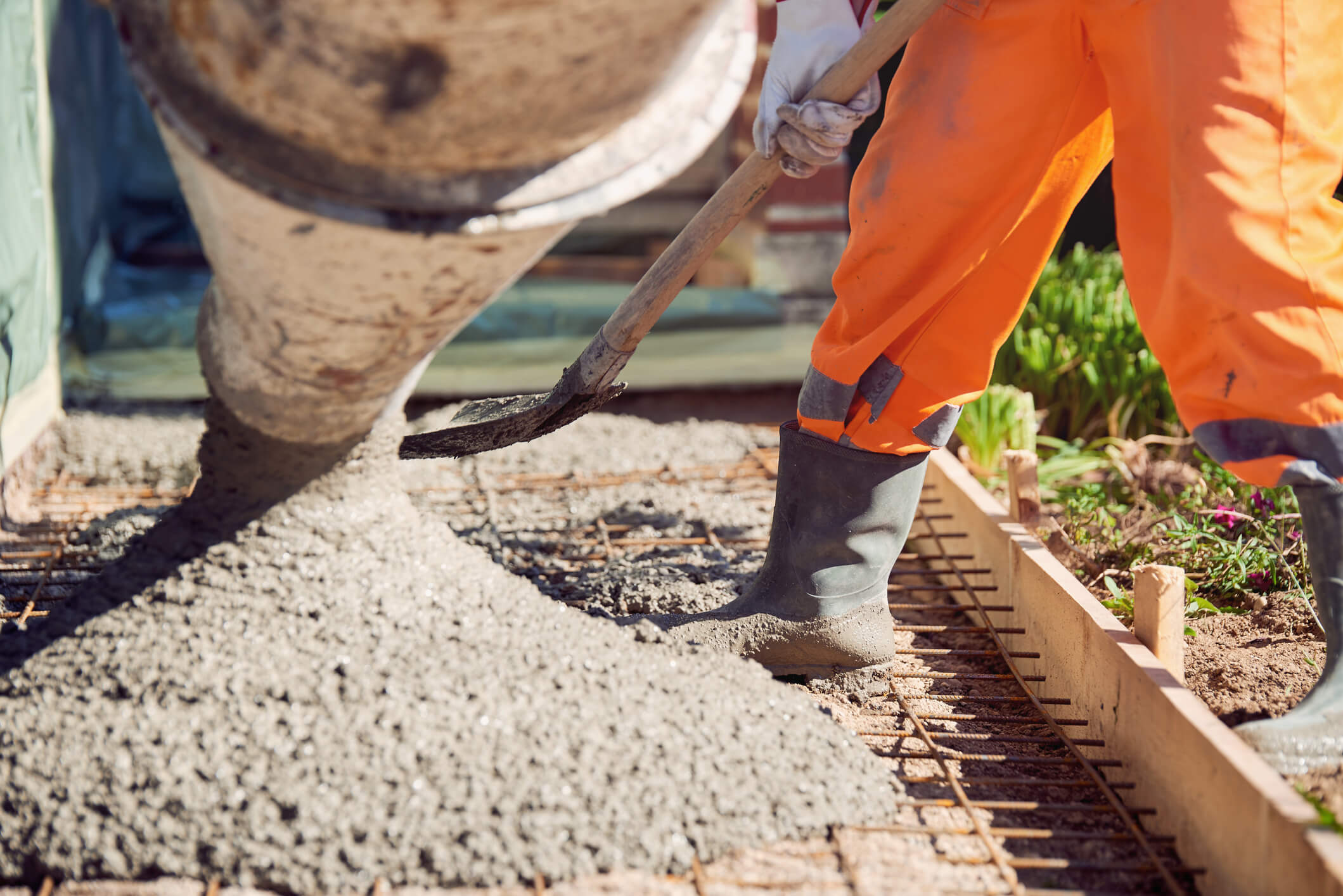 Worker Pouring Concrete