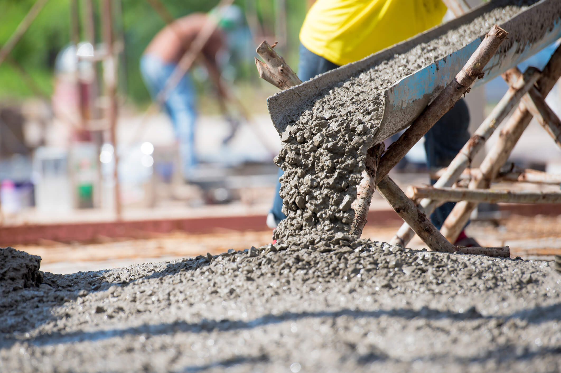 Worker Pouring Concrete