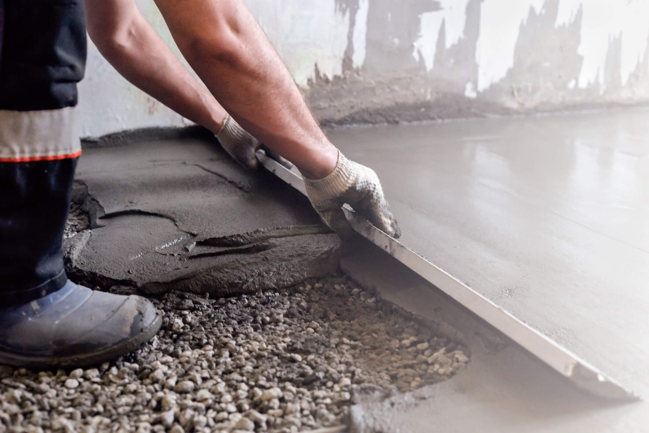 Worker Shaping Concrete